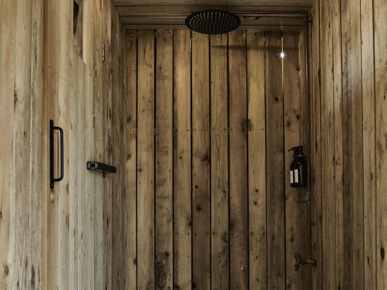 Private showers in every sauna cabin